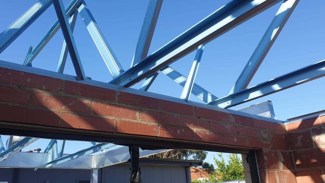 close-up-shot-of-roof-trusses-by-steel-frames-wa-scaled.jpg